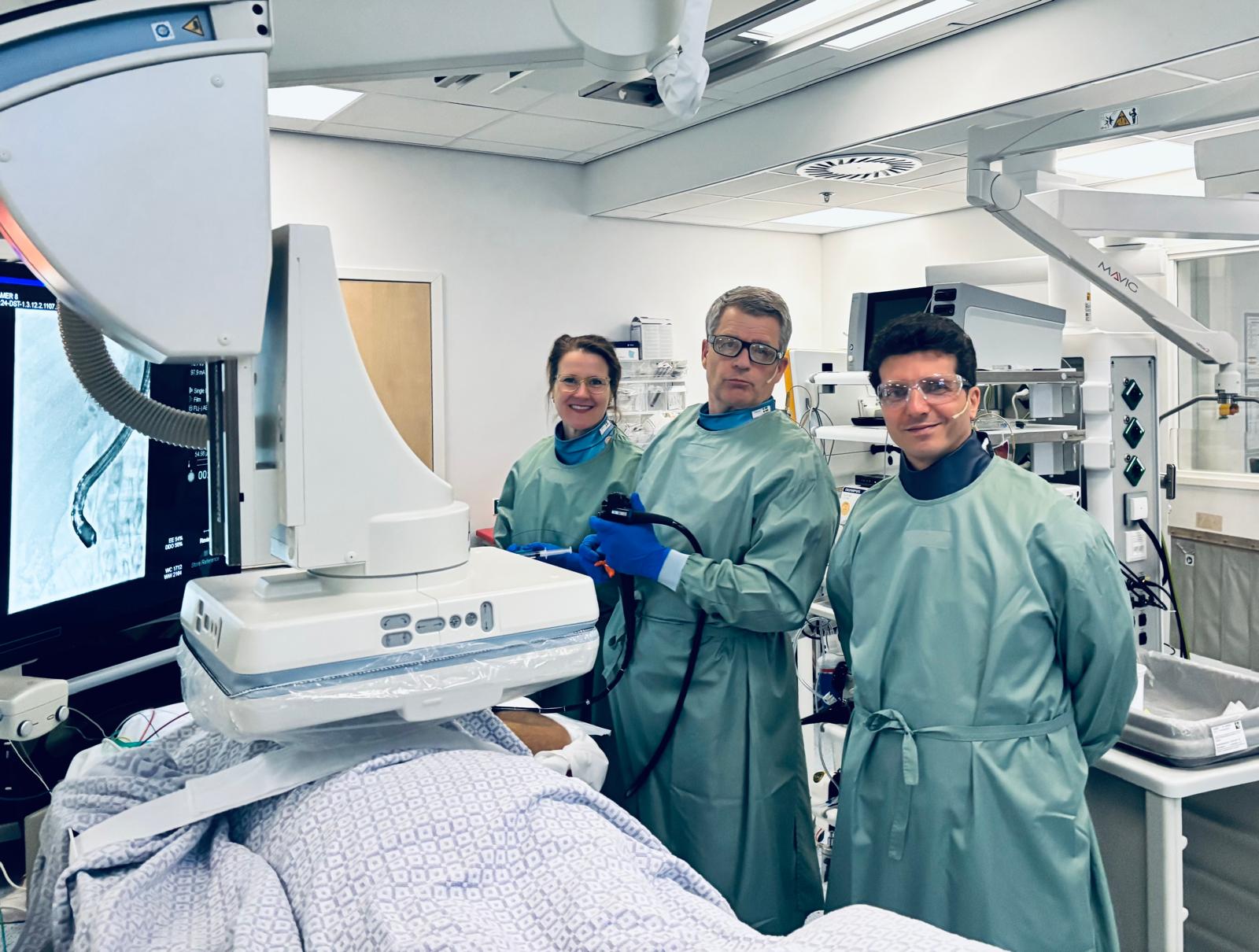 Faculty performing a live endoscopy procedure